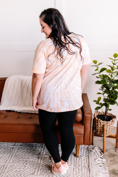 You Spin Me Round Spiral V Neck Tee in Orange Cream*
