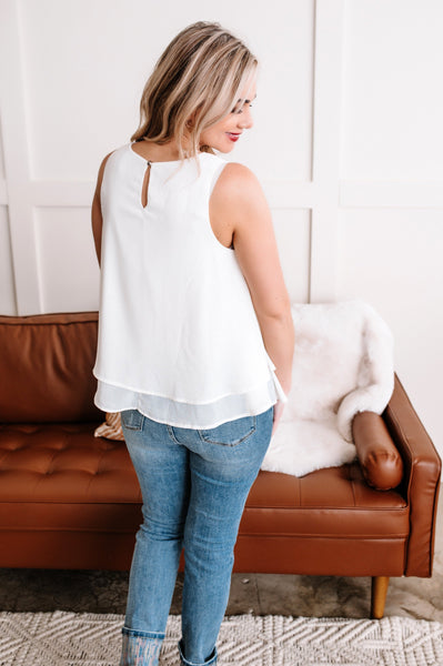 OUTLET  Trickle Down Effect Flowy Sleeveless Top In Cream