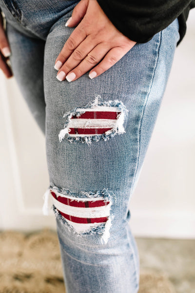 Mid Rise Bootcut Judy Blue Jeans With Plaid Patch Detail.