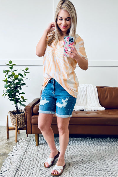 You Spin Me Round Spiral V Neck Tee in Orange Cream*